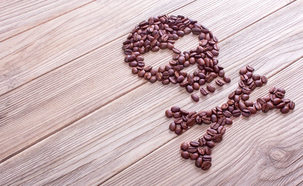 Coffee beans made to look like a skull and crossbones 