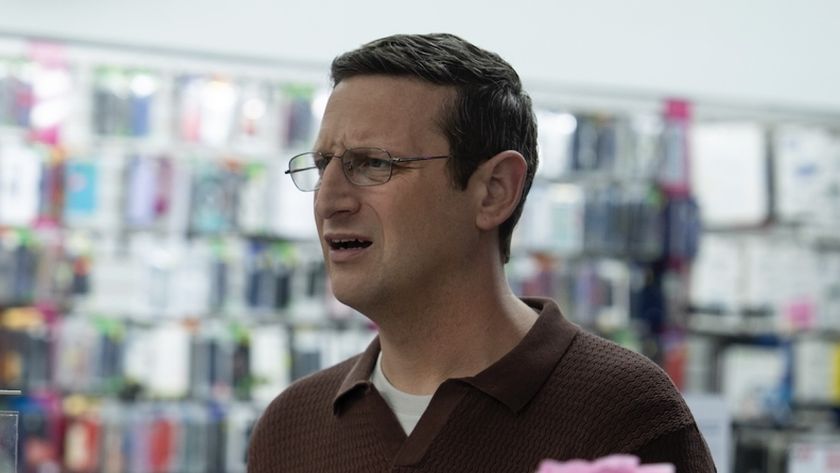 Ron at phone business in The Chair Company