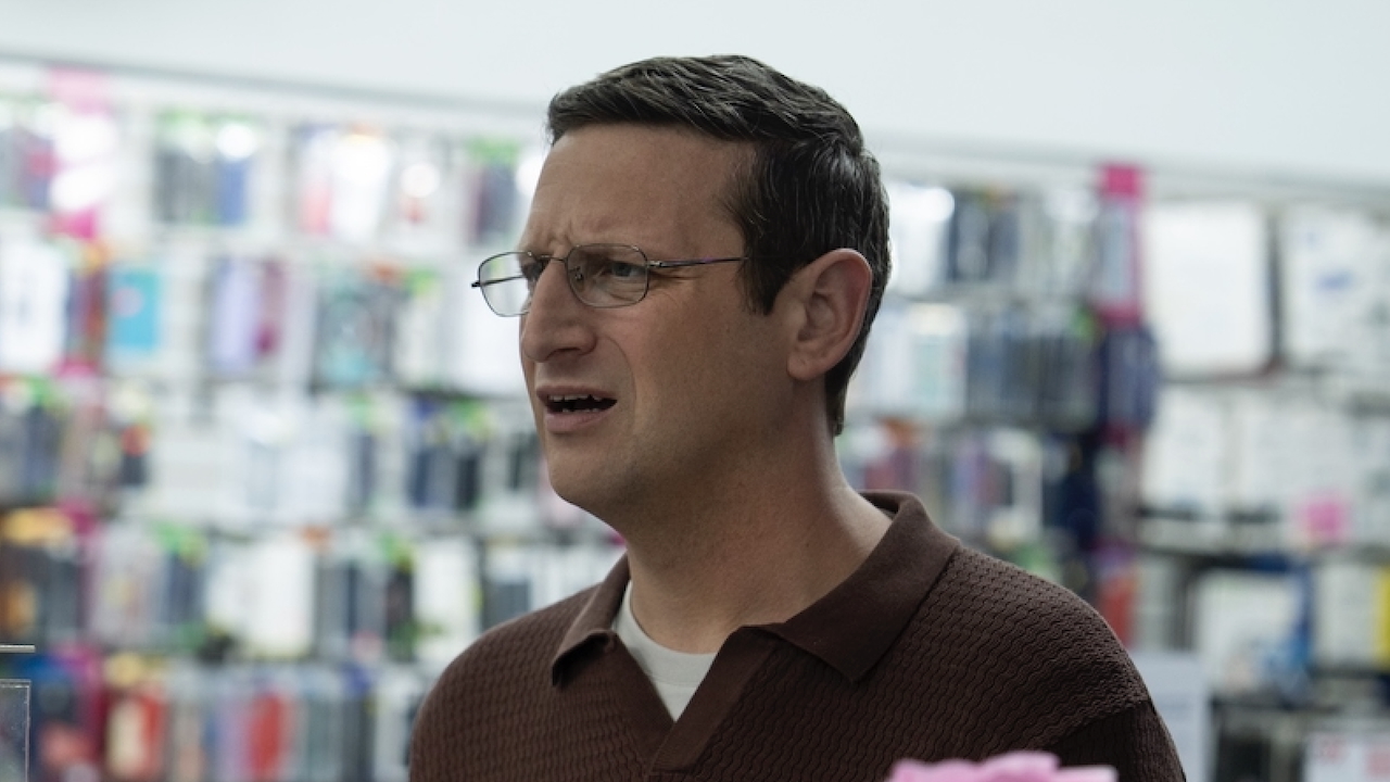 Ron at phone business in The Chair Company