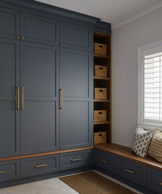 mudroom with charcoal gray cabinetry