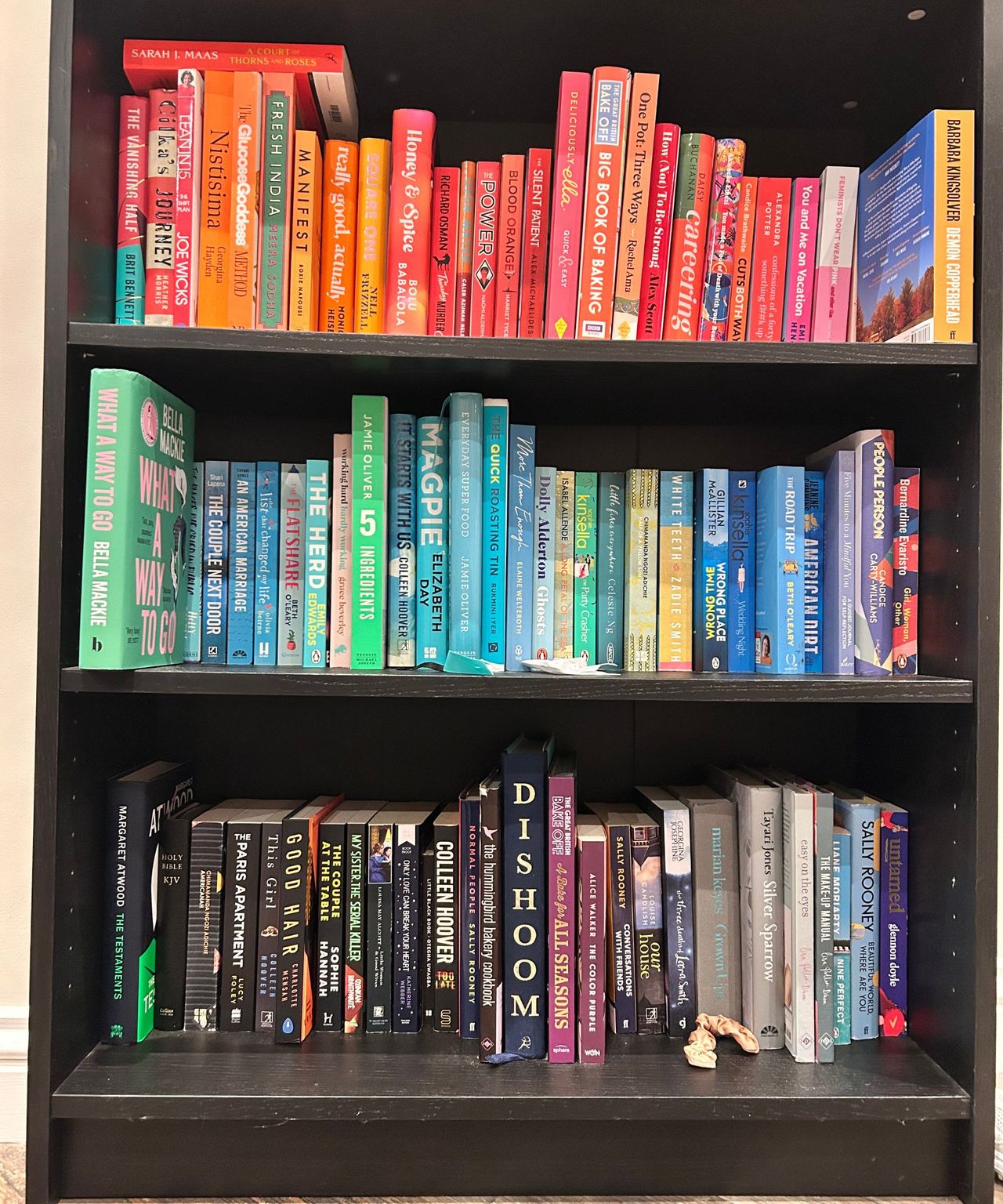 Before and after of a colour-coordinated bookshelf