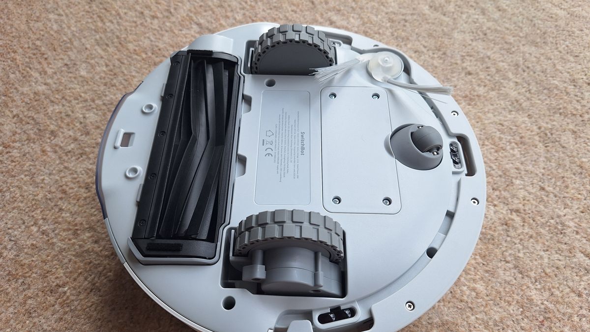 SwitchBot K11+ robot vacuum flipped over to show underside