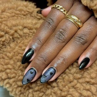 Black heart nail design