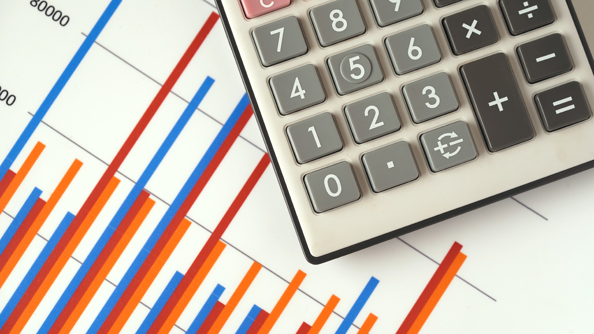 Photograph of calculator and graph