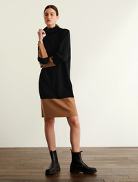 8. Pure Merino Wool Roll Neck Midi Shift Dress
RRP: £150
Sponsored
Is there anything easier to wear than a soft, shift jumper dress? A winter wardrobe staple, you'll find yourself reaching for this chic black and camel dress on a weekly basis. Made with 97% merino wool this is Jaeger quality with longevity in mind. 