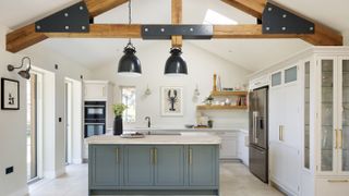 open plan kitchen with large island and vaulted ceiling