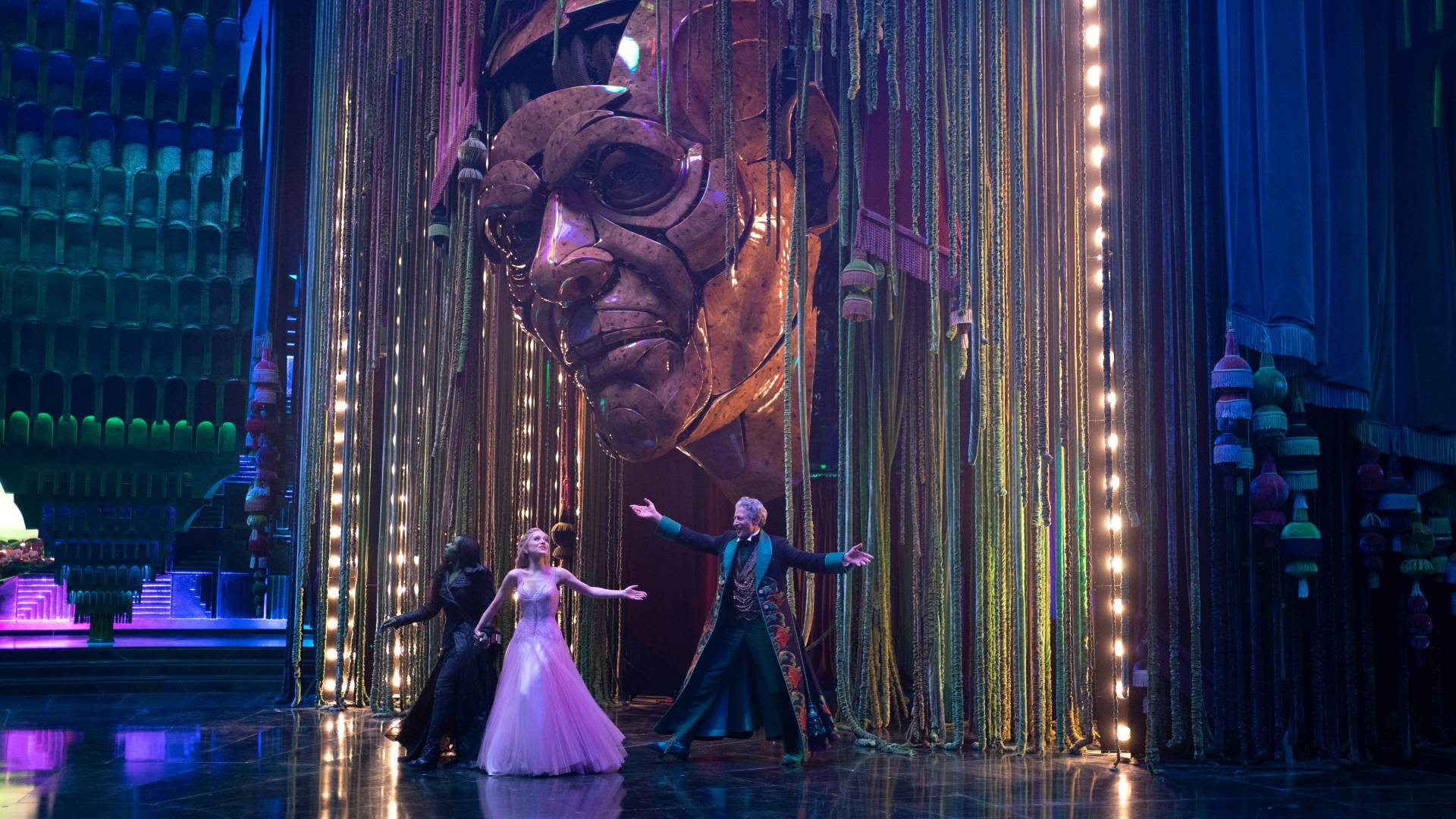 Cynthia Erivo as Elphaba, Ariana Grande as Glinda, and Jeff Goldblum as the Wizard in Wicked: For Good