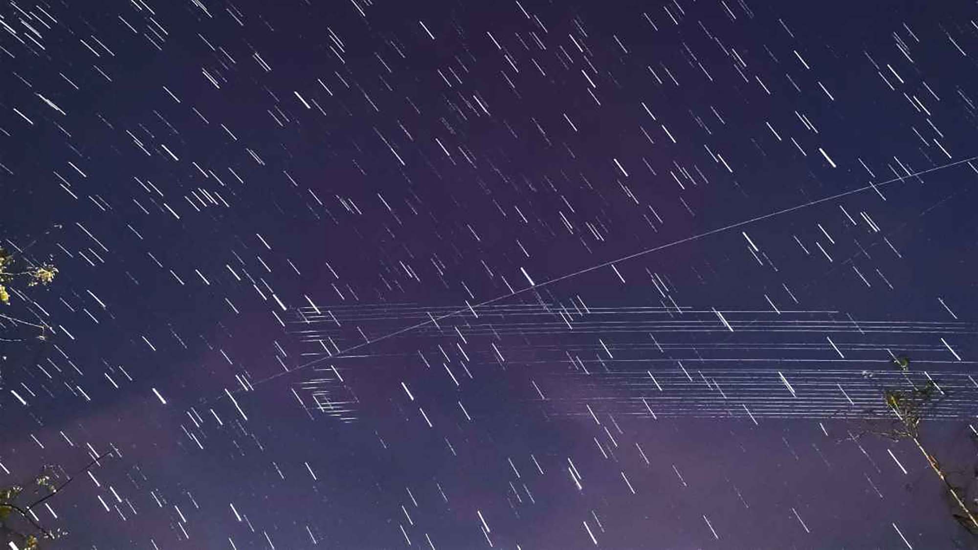 A batch of Starlink satellites streaking across the night sky over Manila.