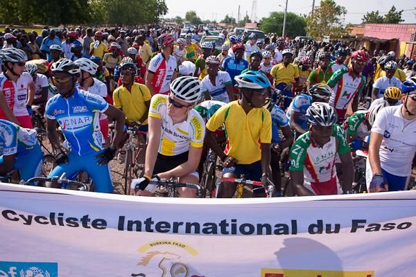 Riders from thirteen teams, representing ten different countries, line up for the start of Stage 1.