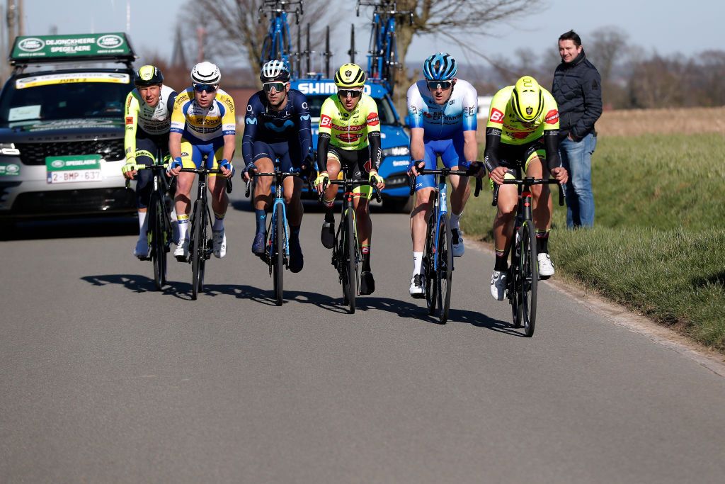 KUURNE BELGIUM FEBRUARY 27 Taco Van Der Hoorn of Netherlands and Team Intermarch Wanty Gobert Matriaux Lluis Mas Bonet of Spain and Movistar Team Luke Durbridge of Australia and Team Bikeexchange Jayco Wessel Krul of Netherlands and Team Human Powered Health Arjen Livyns of Belgium and Team Bingoal Pauwels Sauces WB Jules Hesters of Belgium and Team Sport Vlaanderen Baloise and Bas Tietema of Netherlands and Team Bingoal Pauwels Sauces WB compete in the breakaway during the 74th Kuurne Bruxelles Kuurne 2022 a 1951km race from Kuurne to Kuurne KuurneBxlKuurne on February 27 2022 in Kuurne Belgium Photo by Bas CzerwinskiGetty Images