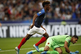 Kingsley Coman, scores the opening goal against Albania