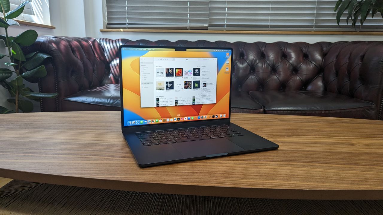15-inch MacBook Air on wooden table at home