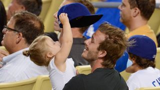 David Beckham - Harper Beckham - baseball game - Marie Claire - Marie Claire UK