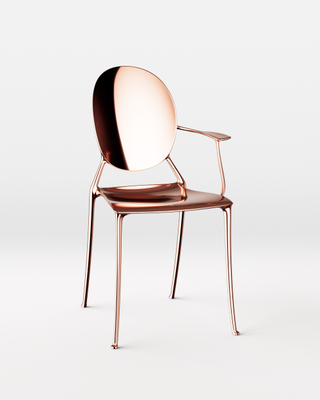 Starck’s ‘Miss Dior’ chair in rose copper, with one armrest
