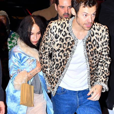 Zo&euml; Kravitz wearing a light-blue silk coat with fur trim from Conner Ives while attending the SNL after party with Harry Styles.