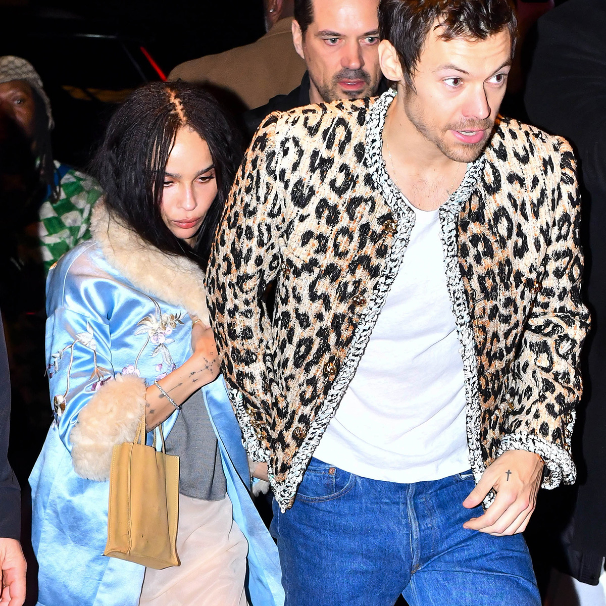 Zo&euml; Kravitz wearing a light-blue silk coat with fur trim from Conner Ives while attending the SNL after party with Harry Styles.