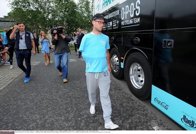 Mark Cavendish was around before the start, with his arm in a sling