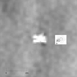 Zoom-up of the Beagle 2 lander location on Mars, with a cartoon sketch of the lander superimposed at the same scale.