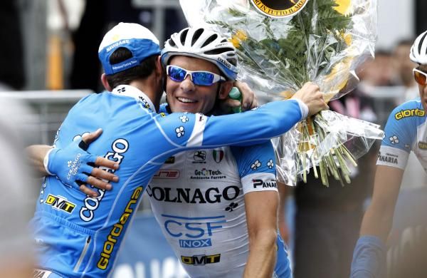 Manuel Belletti is congratulated by a teammate