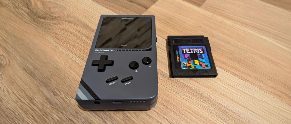 Modretro Chromatic review; a game boy like retro controller on a wooden table