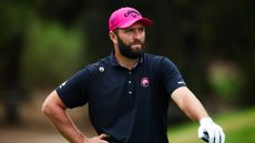 Jon Rahm stands with his hand on the head of his driver during the final round of the 2025 Open de España