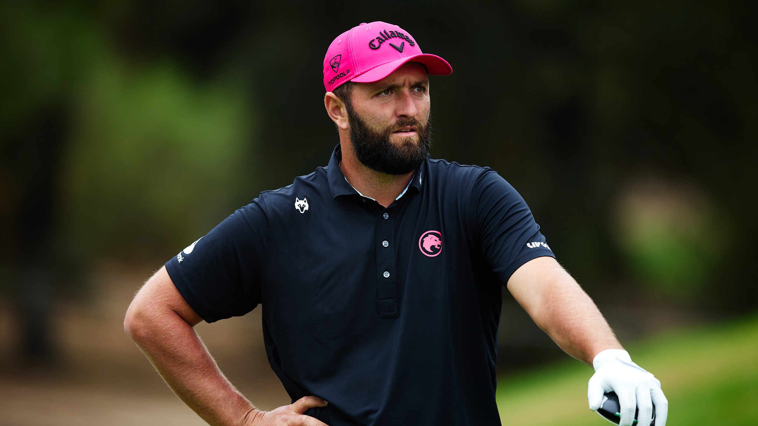 Jon Rahm stands with his hand on the head of his driver during the final round of the 2025 Open de España