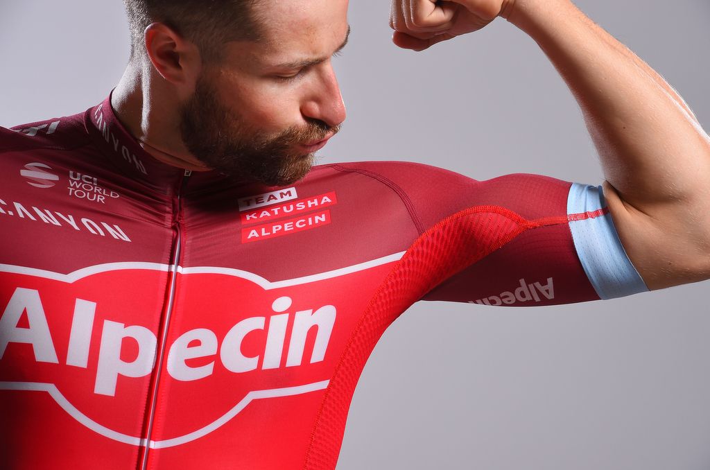 Marco Haller flexes his mucles and shows off the new kit