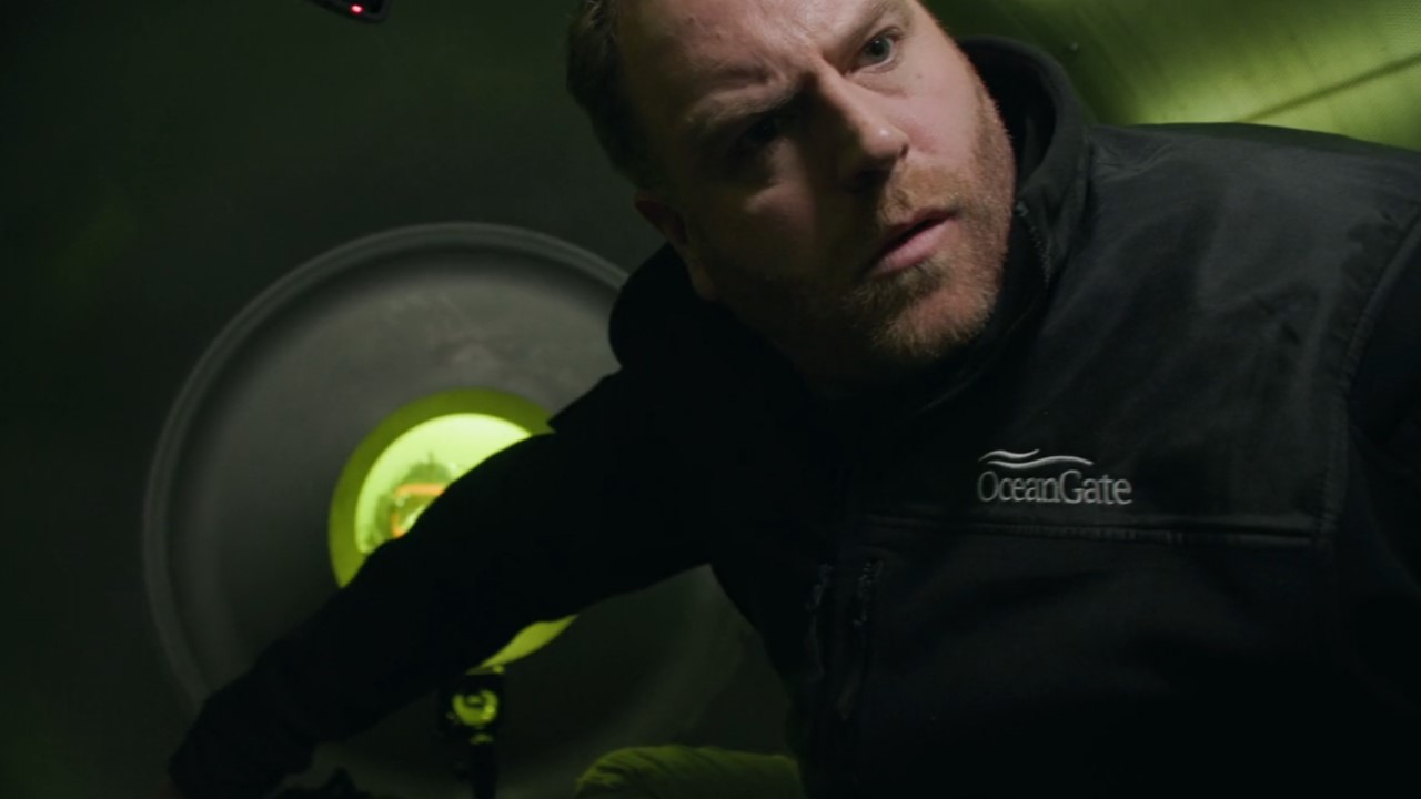 Josh Gates gives a serious look in footage from his dive on the Titan, aired on the Implosion: The Titanic Sub Disaster documentary.
