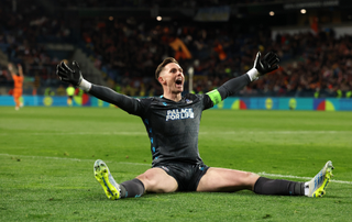 Dean Henderson of Crystal Palace celebrates as teammate Jorgen Strand Larsen (not pictured) scores his team's third goal during the UEFA Europa Conference League match
