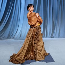 zoe kravitz on the red carpet at the 2025 academy museum gala