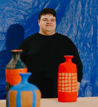 Alfred Lowe, photographed by Emmaline Zanelli, in the ceramics space of the APY Art Centre Collective, Adelaide