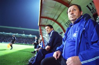 Auxerre coach Guy Roux looks on during a match against Nancy in May 2000.