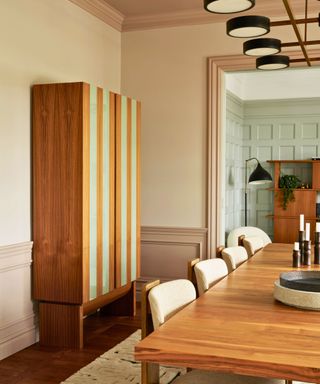 dining room with wooden display cabinet and table