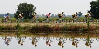 Pink jersey (C) Dutch Steven Kruijswijk (Lotto NL) rides with teammates during the 18th stage of the 99th Giro d'Italia