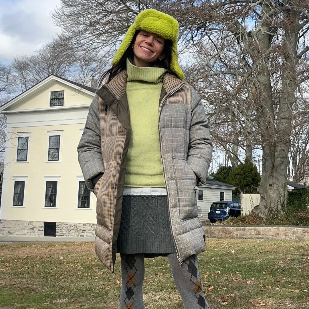 Julia Gall wearing a winter outfit demonstrating her citrus theory