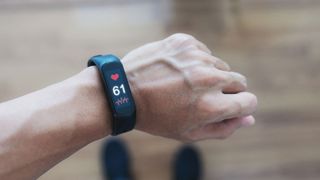 How accurate are fitness trackers: Image shows fitness tracker and heart rate monitor