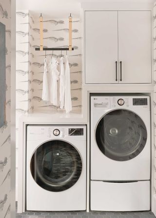 small laundry room with fossil wallpaper