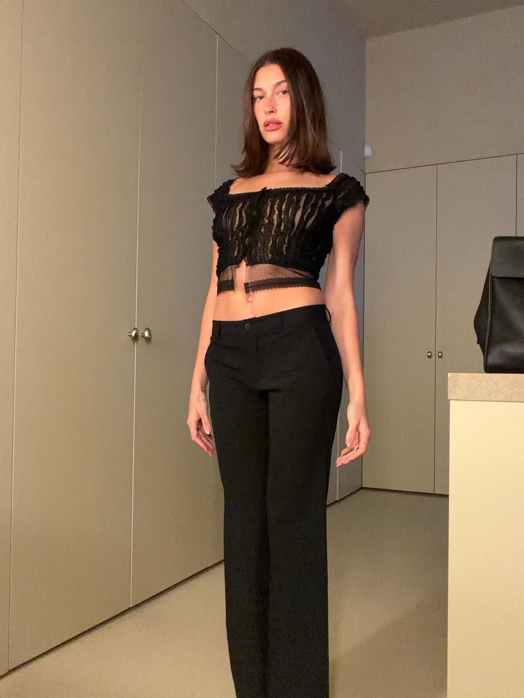 Hailey Bieber Pairs a Sheer Lace Top With a Celeb-Beloved Chanel Tote Bag