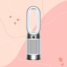 Dyson Purifier Hot+Cool HP1 Purifying Fan Heater on a pink background