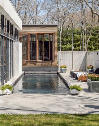 modern small pool by house