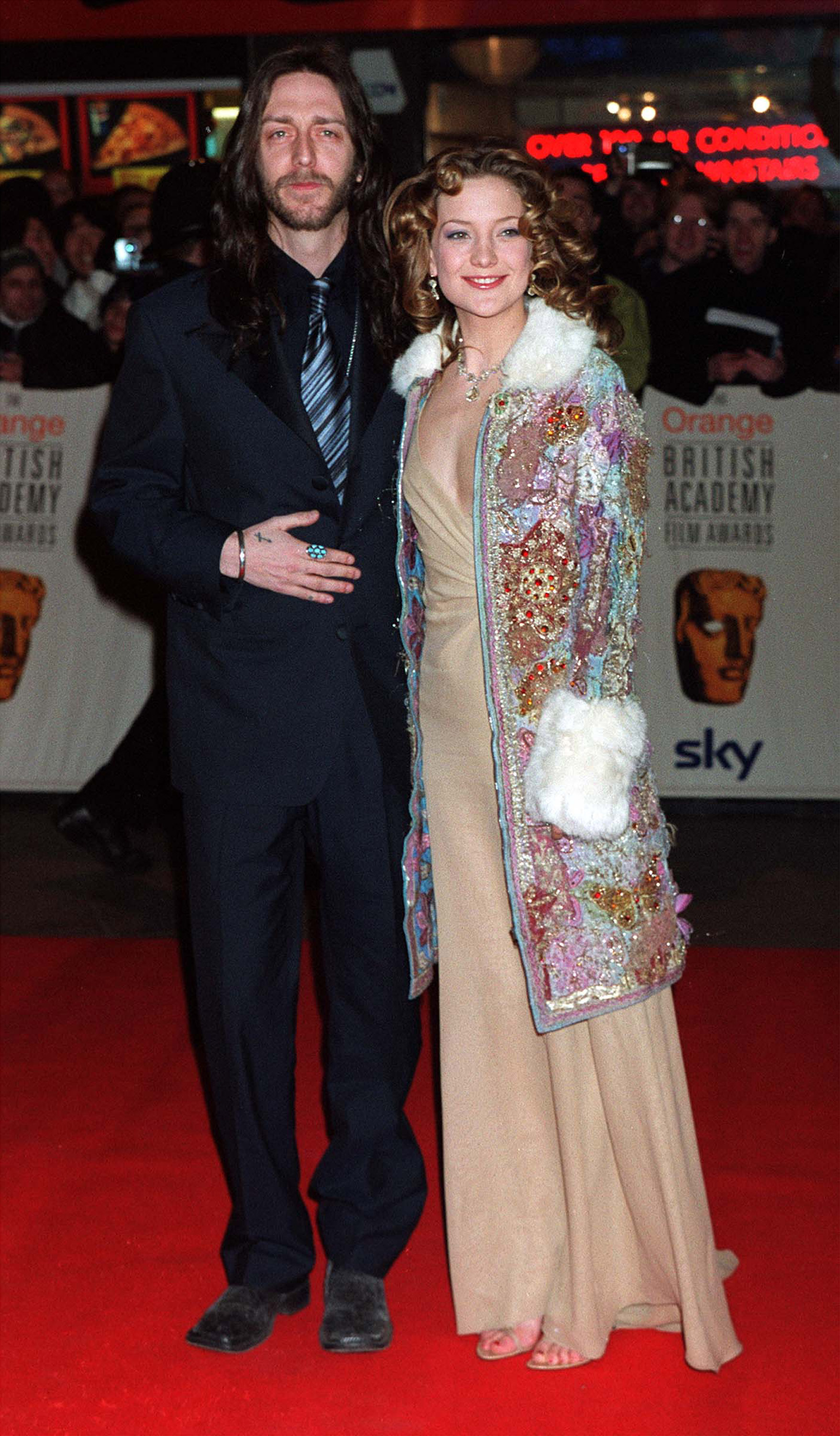 385971 23: Actress Kate Hudson and Chris Robinson from the Black Crowes arrive at the British Academy Film Awards, February 25, 2001 at Odeon Leicester Square in London. (Photo by UK Press/Newsmakers)