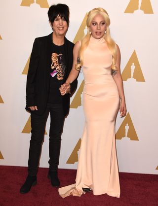 Poker face, Warren and Lady Gaga at the 88th Academy Awards Nominee Luncheon