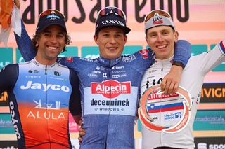 SANREMO ITALY MARCH 16 LR Michael Matthews of Australia and Team Jayco AlUla on second place race winner Jasper Philipsen of Belgium and Team Alpecin Deceuninck and Tadej Pogacar of Slovenia and UAE Team Emirates on third place pose on the podium ceremony after the 115th MilanoSanremo 2024 a 288km one day race from Pavia to Sanremo UCIWT on March 16 2024 in Sanremo Italy Photo by Dario BelingheriGetty Images