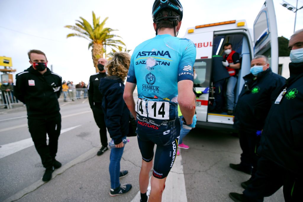 LAGOS PORTUGAL FEBRUARY 16 Joseph Lloyd Dombrowski of United States and Team Astana Qazaqstan injurys after crossing the line the 48th Volta Ao Algarve 2021 Stage 1 a 1991km at stage from Portimo to Lagos VAlgarve2022 on February 16 2022 in Lagos Portugal Photo by Luc ClaessenGetty Images