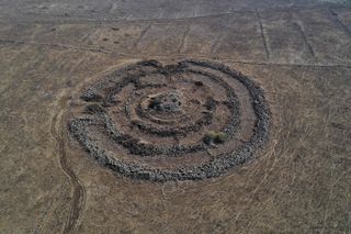 An aerial picture taken on November 10, 2021 shows Rujm el-Hiri, an archaeological site of the early bronze age II period (3000-2700 BCE) located at the centre of the Israel-annexed Golan Heights near the settlement of Yonatan.