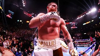 Canelo Alvarez celebrates his 11th round technical knock out win against Caleb Plant after their championship bout for Alvarez's WBC, WBO and WBA super middleweight titles