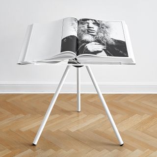 The tripod table comes with the book, and has been specially designed by renown Australian designer Marc Newson