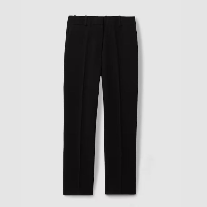 A cutout of slim black tailored trousers by Reiss
