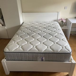 The Sealy Newton Posturepedic Mattress being tested