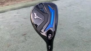 Mizuno ST-Z 230 Hybrid Review held aloft to show its blue speed pocket